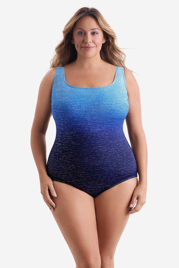 Woman wearing a blue ombre one-piece swimsuit