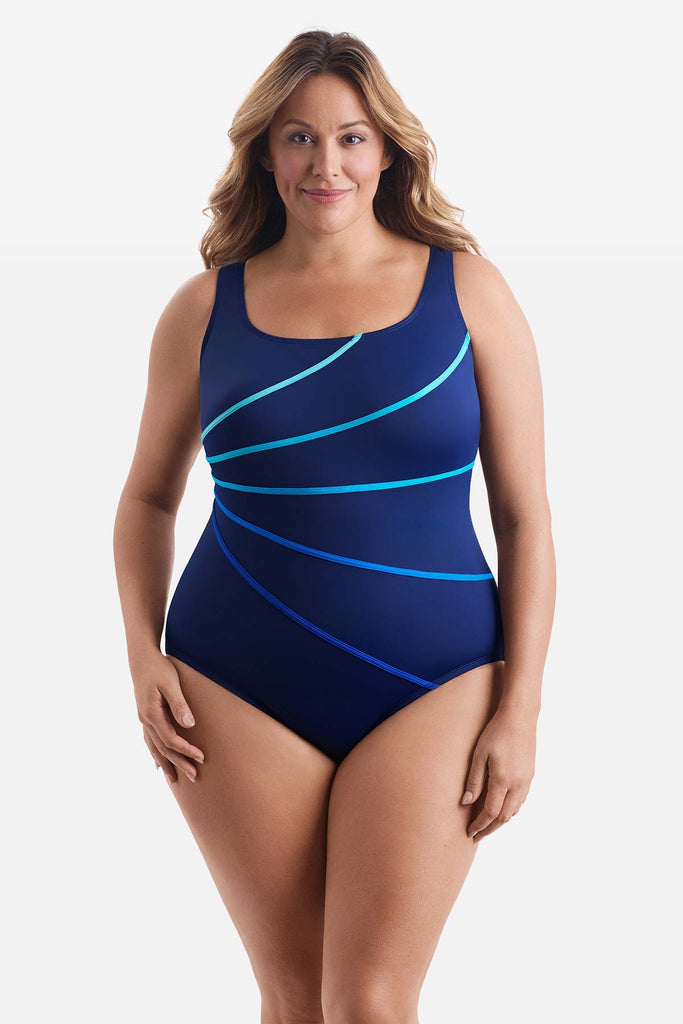 Woman wearing a one-piece swimsuit with five blue ombre streaks on the front