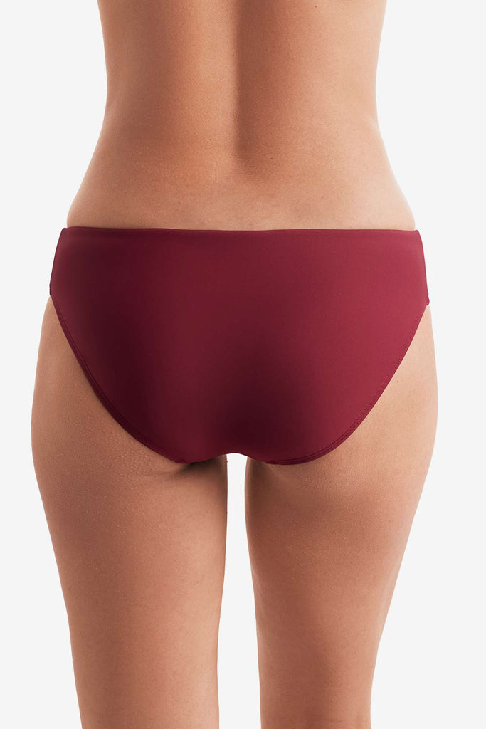 Back of dark red swim bottoms