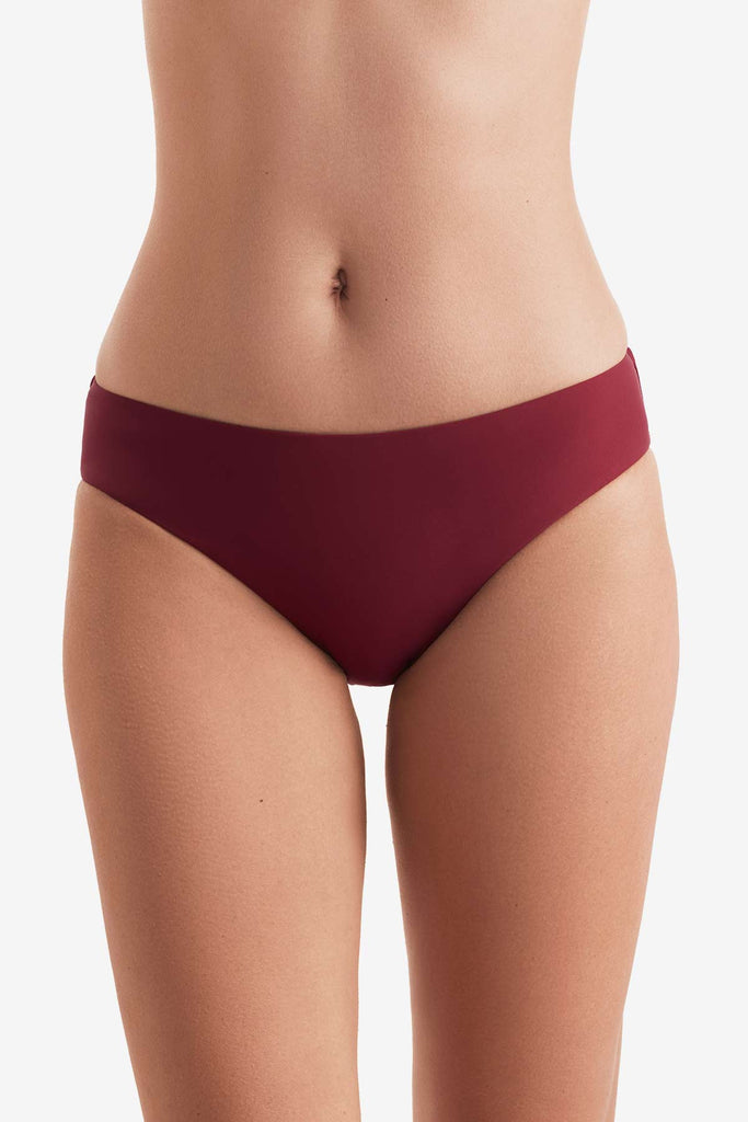 Front of dark red swim bottoms