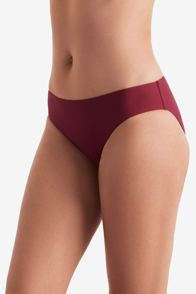 Side of dark red swim bottoms