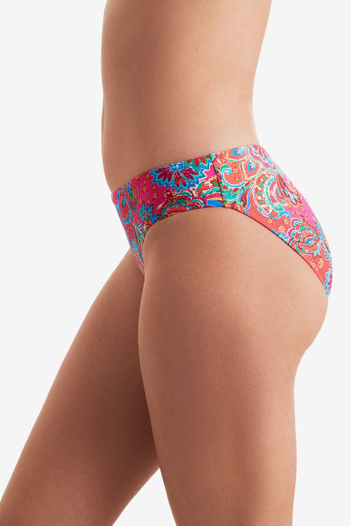 Side of multicolor paisley print swim bottoms