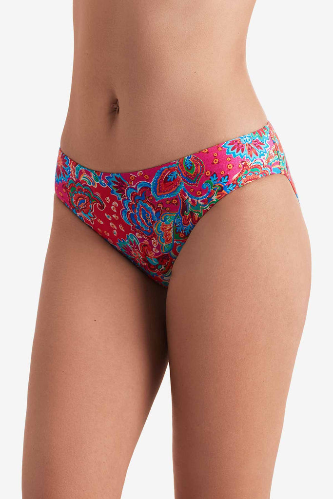 Side of multicolor paisley print swim bottoms