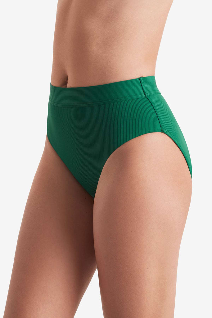 Side of high-waisted green rib fabric swim bottoms