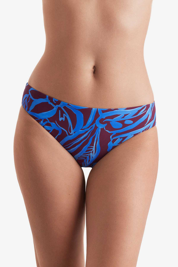 Front of blue and brown abstract printed swim bottoms