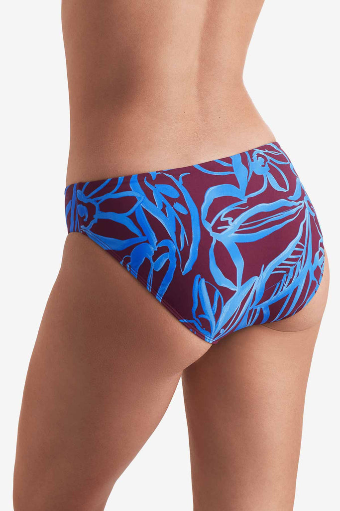 Back of blue and brown abstract printed swim bottoms