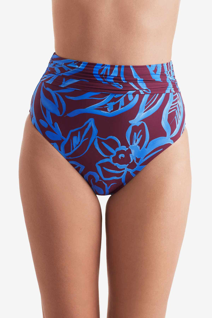 Front of high waisted blue and brown abstract floral printed swim bottoms